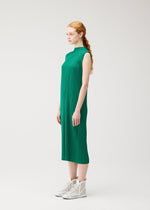 A model wears the PLEATS PLEASE ISSEY MIYAKE MONTHLY COLORS : JULY monthly-colors-july-dress-fresh-green-3.