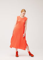 A model wears the PLEATS PLEASE ISSEY MIYAKE MONTHLY COLORS : SEPTEMBER dress.