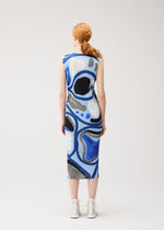 A model wears the PLEATS PLEASE ISSEY MIYAKE ROLL roll-dress-light-blue.