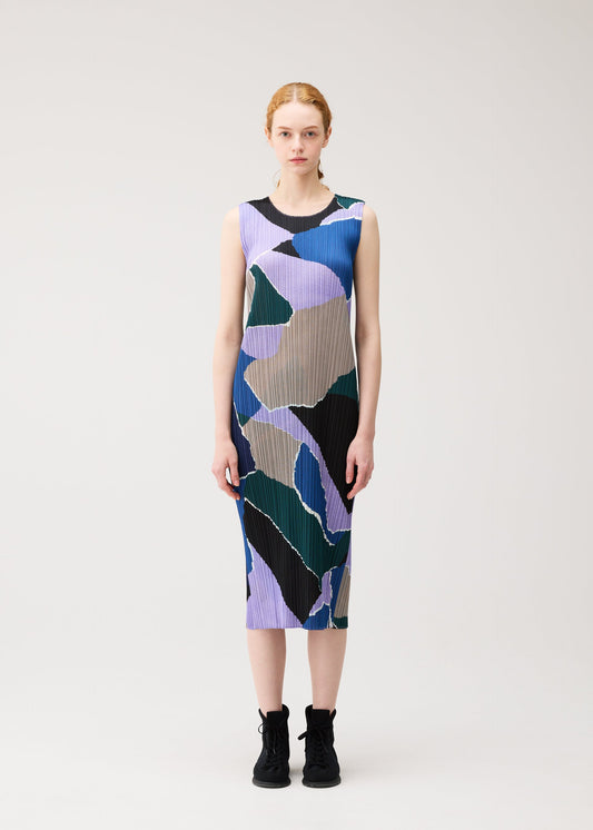 A model wears the PLEATS PLEASE ISSEY MIYAKE SURPRISE! dress.