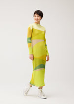 A model wears the PLEATS PLEASE ISSEY MIYAKE ORBIT dress.