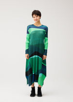 A model wears the PLEATS PLEASE ISSEY MIYAKE ORBIT dress.