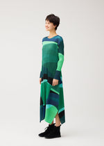 A model wears the PLEATS PLEASE ISSEY MIYAKE ORBIT dress.