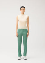 A model wears the PLEATS PLEASE ISSEY MIYAKE MONTHLY COLORS : AUGUST monthly-colors-august-shirt-greyish-purple.