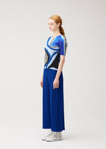 A model wears the PLEATS PLEASE ISSEY MIYAKE ROLL roll-shirt-multi-1.