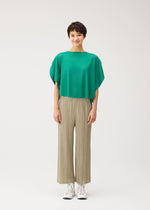A model wears the PLEATS PLEASE ISSEY MIYAKE A-POC SLICE a-poc-slice-shirt-white.