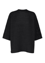 A product shot of the PLEATS PLEASE ISSEY MIYAKE DOT KNIT shirt in black.