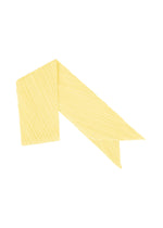 A product shot of the PLEATS PLEASE ISSEY MIYAKE MONTHLY SCARF JULY stole in pale yellow.