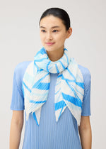A model wears the PLEATS PLEASE ISSEY MIYAKE FOLD LINE SCARF fold-line-scarf-stole-off-white.