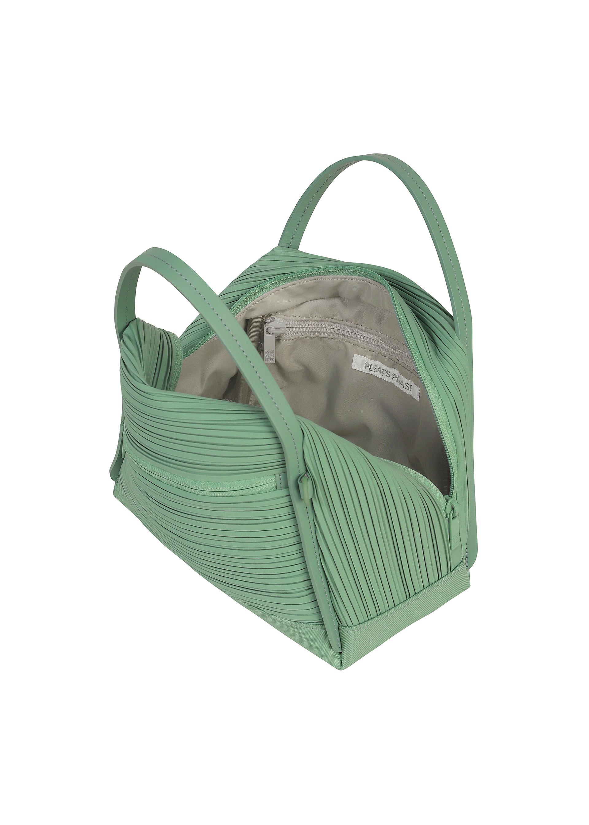 A detail shot of the PLEATS PLEASE ISSEY MIYAKE BIAS PLEATS BAG bag.
