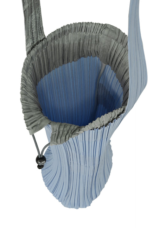 A detail shot of the PLEATS PLEASE ISSEY MIYAKE PLEATS SWAN BAG bag.