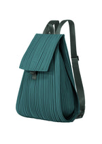 A detail shot of the PLEATS PLEASE ISSEY MIYAKE PLEATS KNAPSACK bag.